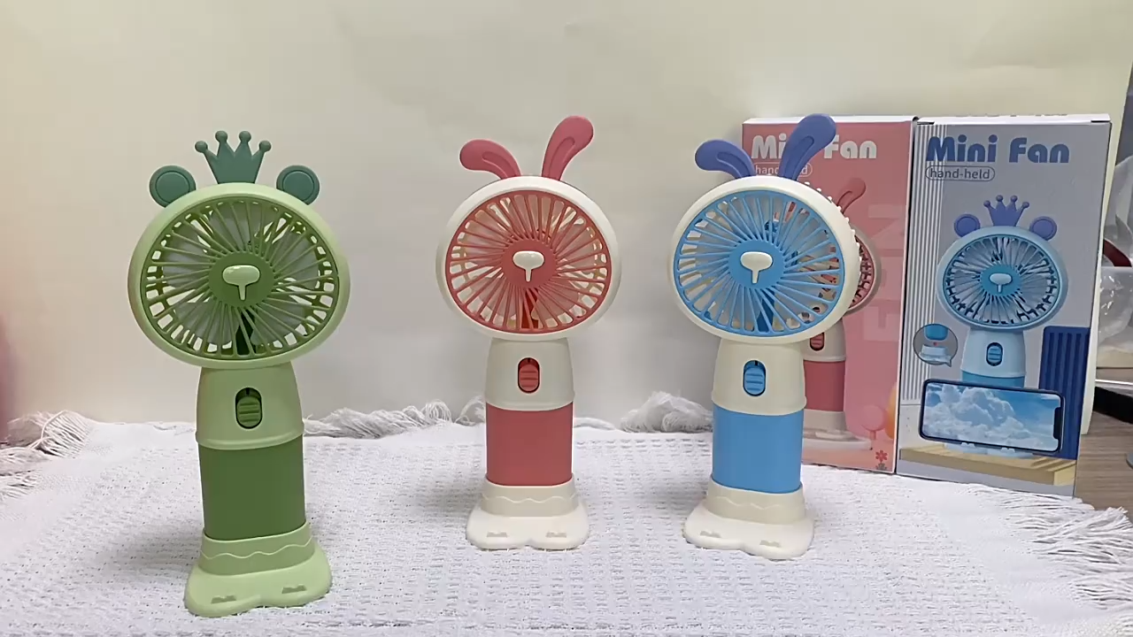 HK-59-8A Cartoon Cute Mini Fan – USB Rechargeable Handheld &amp; Desktop Portable Fan